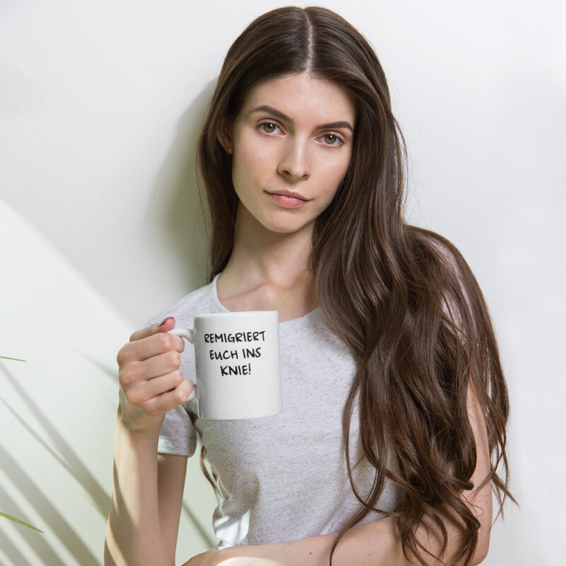 Remigriert euch ins Knie weiße, glänzende Tasse